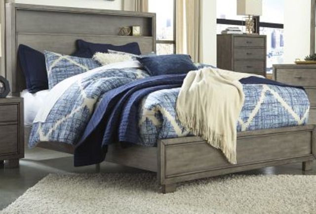 Minimalist grey wood bed with a shelf in the headboard 