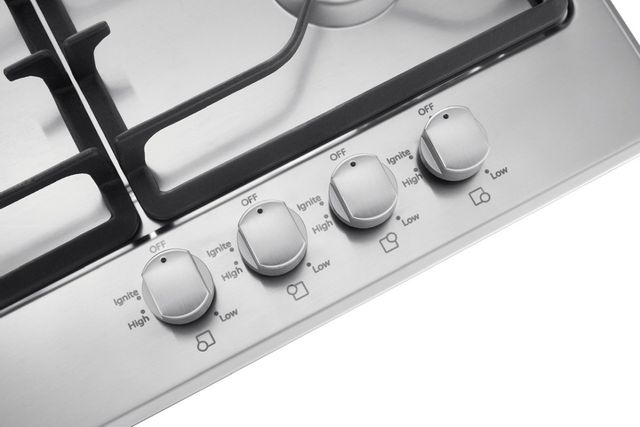 Whirlpool® 24" Black On Stainless Gas Cooktop 1