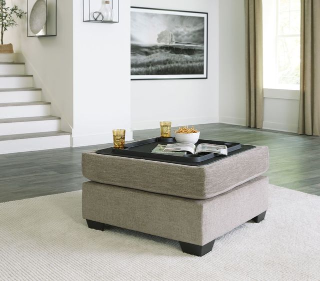 Signature Design by Ashley® Creswell Stone Ottoman with Storage 2