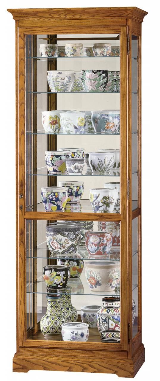 Howard Miller® Chesterfield II Golden Oak Curio Cabinet