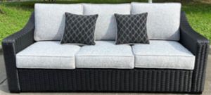 Signature Design by Ashley® Beachcroft Black/Light Gray Outdoor Sofa with Cushion