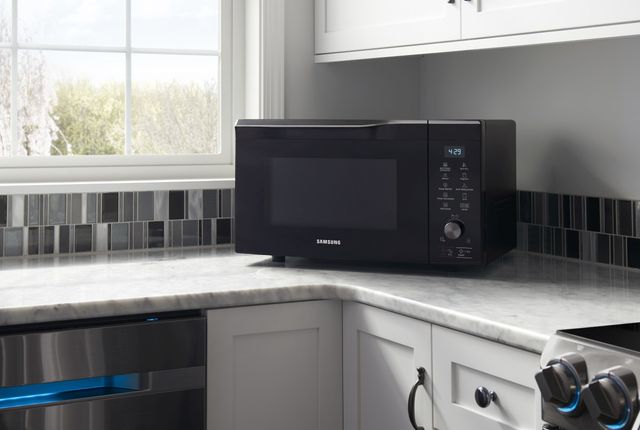 Samsung 1.1 Cu. Ft. Fingerprint Resistant Black Stainless Steel Counter Top Microwave 14