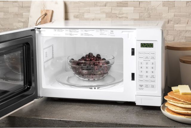 GE® 0.7 Cu. Ft. White Countertop Microwave 4
