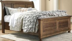 Signature Design by Ashley® Flynnter Tobacco Brown King Sleigh Bed