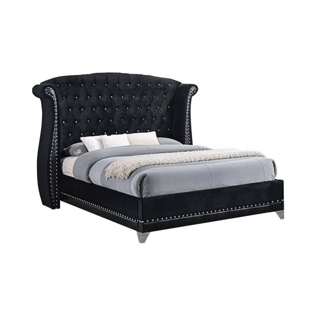 black velvet upholstered sleigh bed