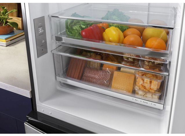 GE® 11.9 Cu. Ft. Stainless Steel Counter Depth Bottom Freezer Refrigerator 8