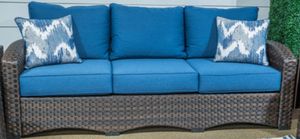 Signature Design by Ashley® Windglow Blue/Brown Outdoor Sofa with Cushion