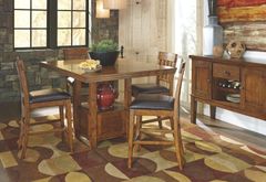 Signature Design by Ashley® Ralene 5pc Medium Brown Counter Height Table Set plus 2 FREE STOOLS P45084979