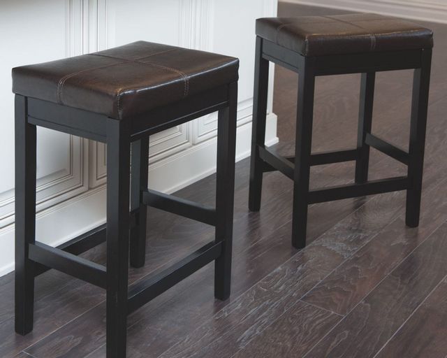 Signature Design by Ashley® Kimonte Dark Brown Upholstered Counter Height Stool 2