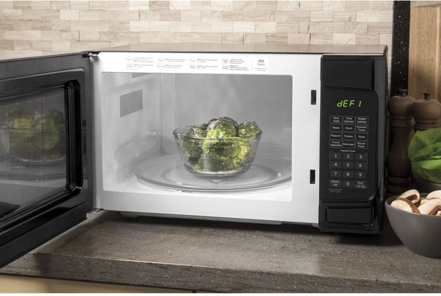 GE® 1.1 Cu. Ft. Black Countertop Microwave-3