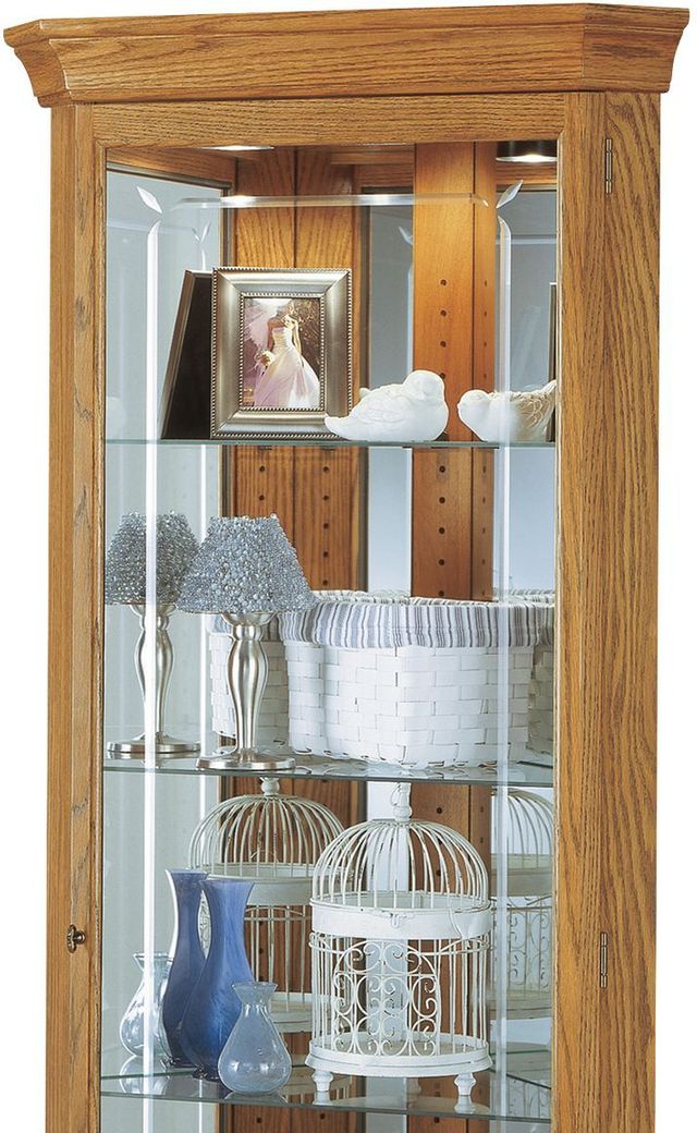 Howard Miller® Hammond Golden Oak Curio Cabinet 1