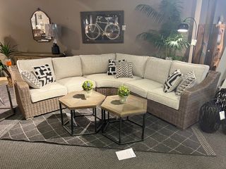 Signature Design by Ashley® Beachcroft Beige Curved 3 Piece Sectional 