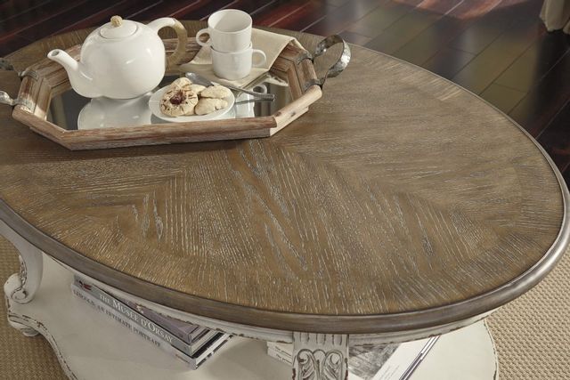 Signature Design by Ashley® Realyn White/Brown Oval Coffee Table 7