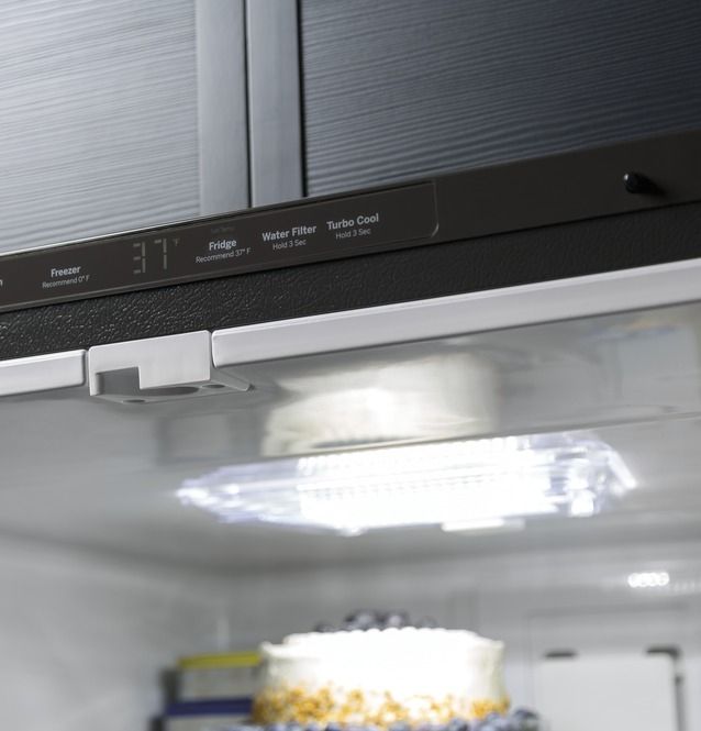 GE® Series 21.0 Cu. Ft. Black Bottom Freezer Refrigerator 34