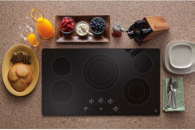 GE® 36" Stainless Steel Built In Electric Cooktop 4