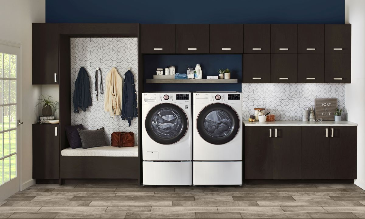 White LG front load washer and dryer in a laundry room
