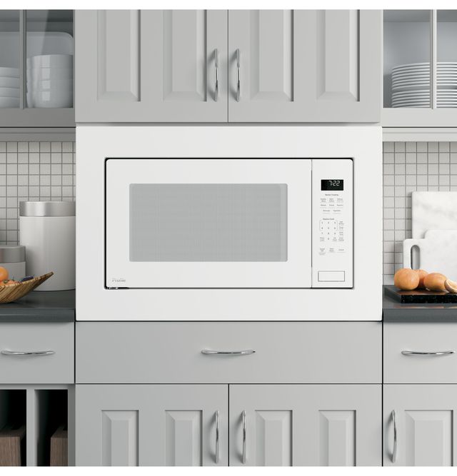 GE Profile™ 2.2 Cu. Ft. White Built In Microwave 28