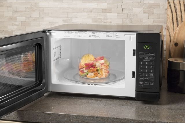 GE® 0.7 Cu. Ft. Black Countertop Microwave 6