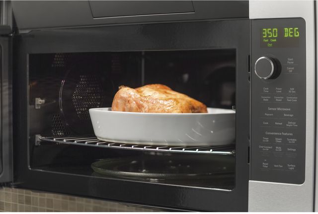 GE Profile™ 1.7 Cu. Ft. Black Slate Over The Range Microwave 12