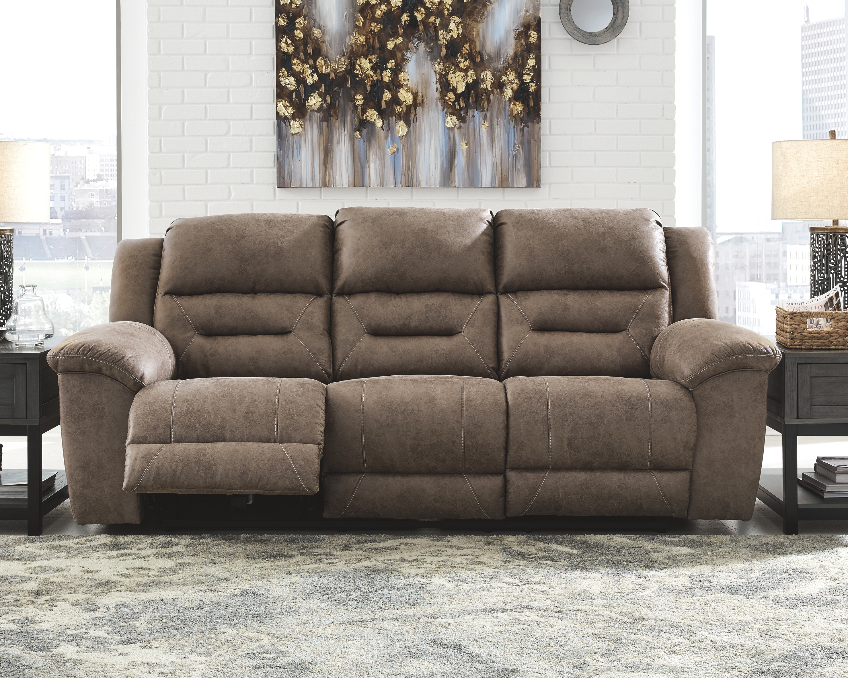 Signature Design By Ashley® Stoneland Fossil Reclining Sofa | Miskelly ...