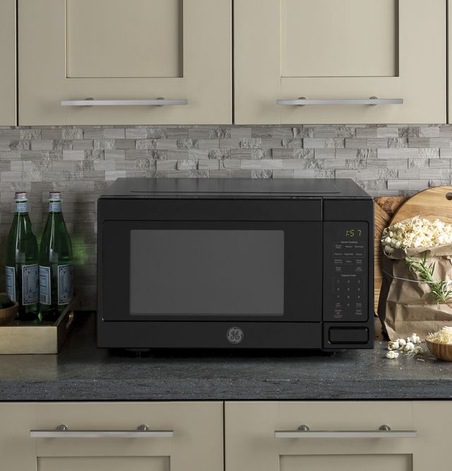 GE® 1.6 Cu. Ft. Black Countertop Microwave 3