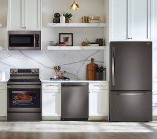 LG 4 Piece Kitchen Package with a 25.50 cu.ft. Total Capacity Bottom Mount Refrigerator PLUS a FREE 5.8 cu. ft. Upright Freezer OR 6.9 cu. ft. All-Refrigerator!