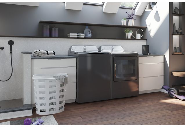 Diamond gray GE Profile washer and dryer in a laundry room