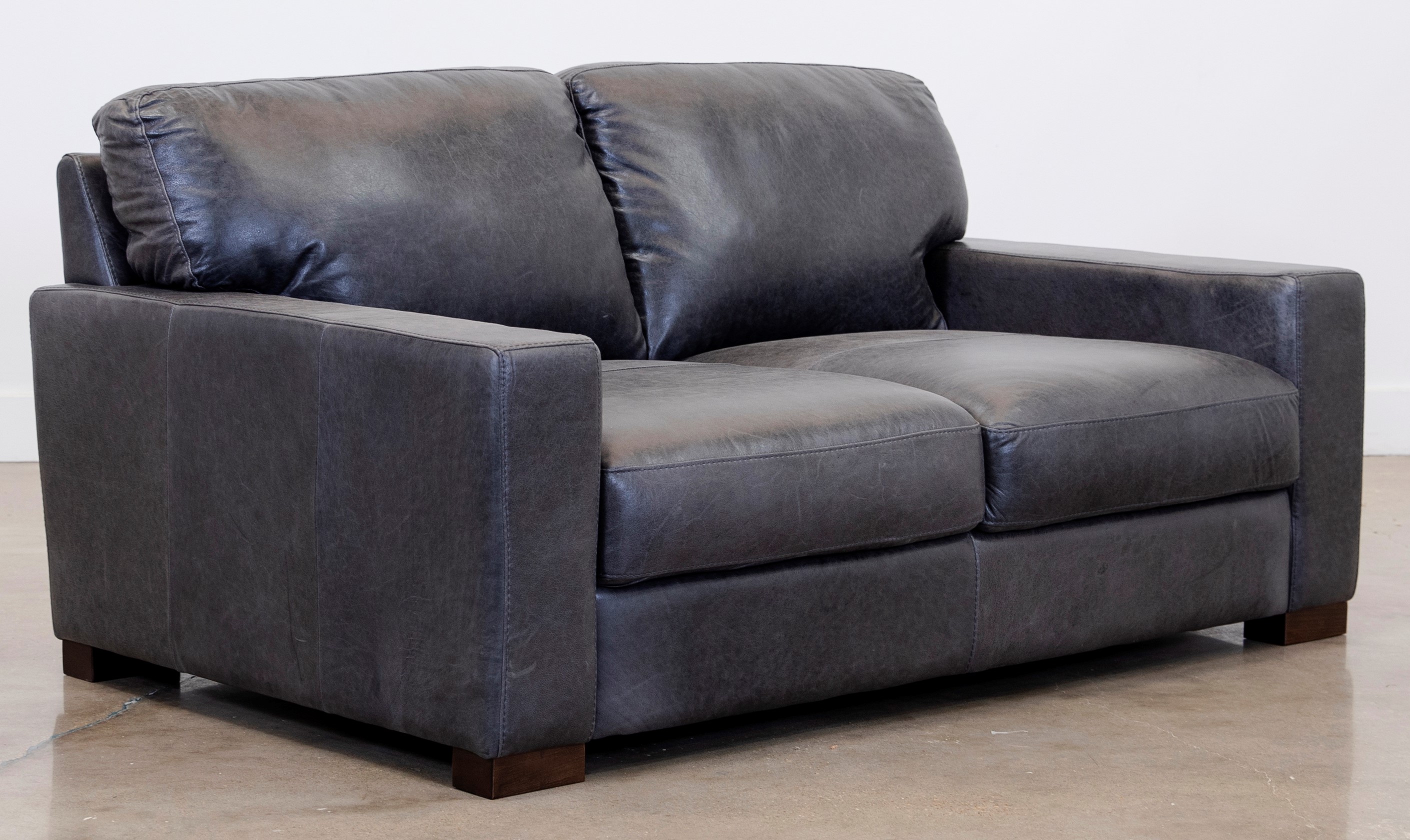 Soft deals leather loveseat