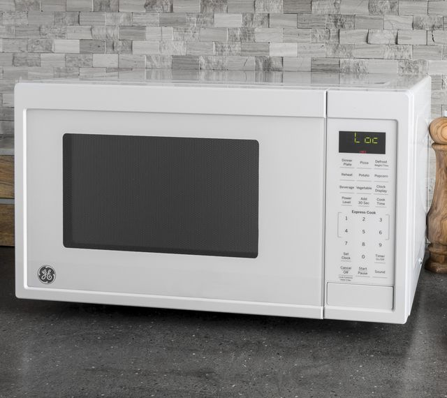 GE® 0.9 Cu. Ft. White Countertop Microwave 4