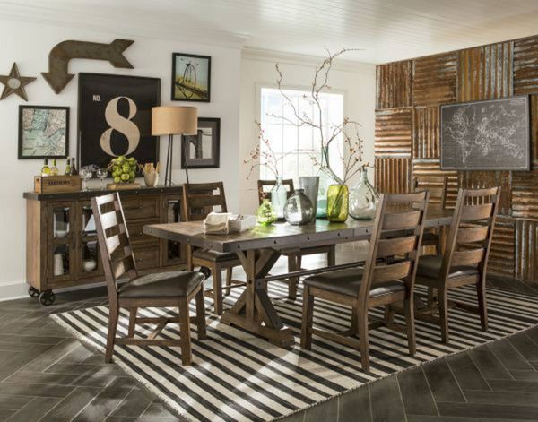 wooden dining table and matching chairs in a modern farmhouse dining room