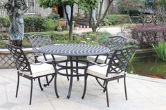 GatherCraft 5 Piece Dining Set with Cushioned Arm Chairs