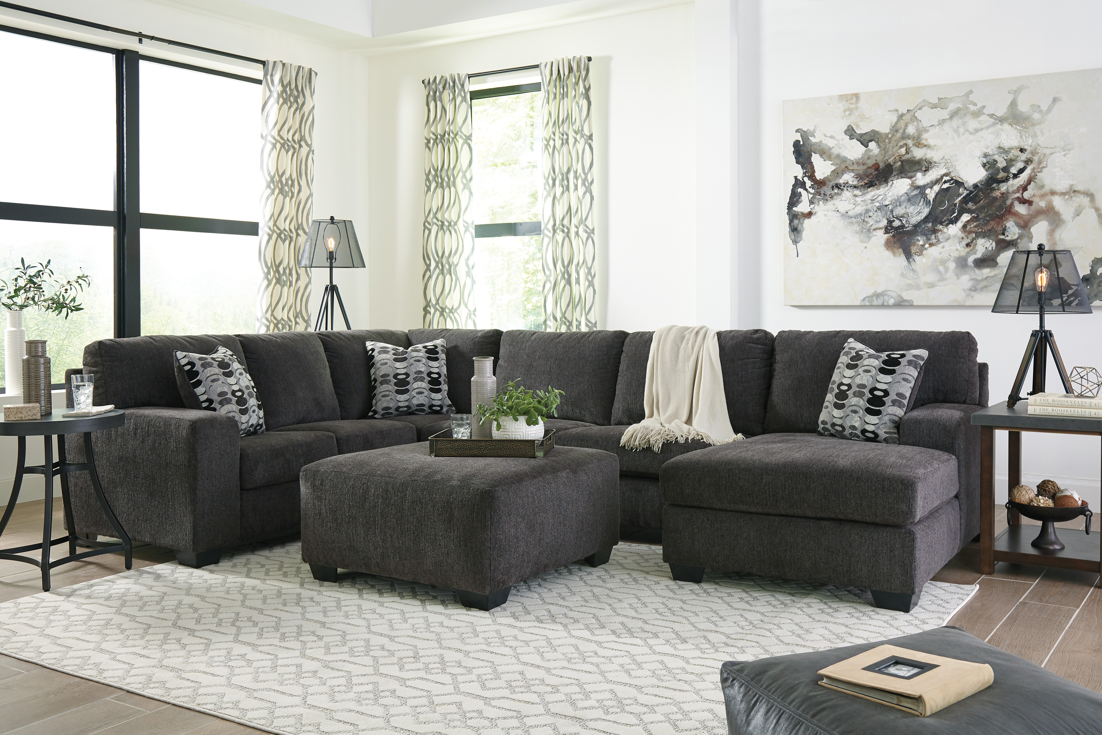 Signature Design by Ashley sectional in a transitional style living room