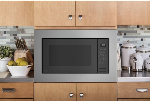 GE Profile™ 2.2 Cu. Ft. White Built In Microwave 16