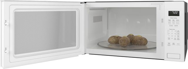 GE Profile™ 2.2 Cu. Ft. White Built In Microwave 3