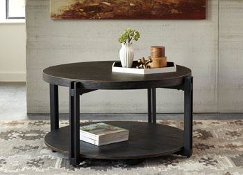 Ashley® Round Cocktail Table 0