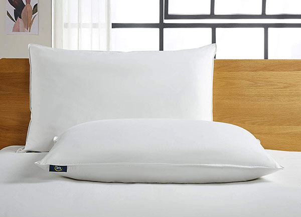 Pillow on top of a bed